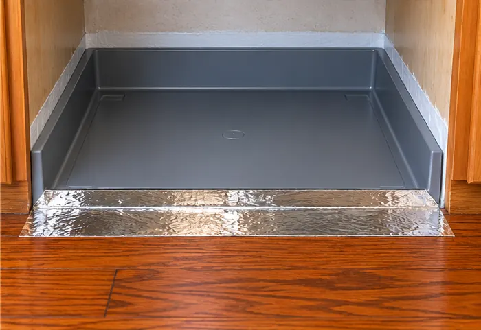 National Floors - Dishwasher Pan Leak Protection Dishwasher pan connected to hardwood floor to make future appliance leaks visible